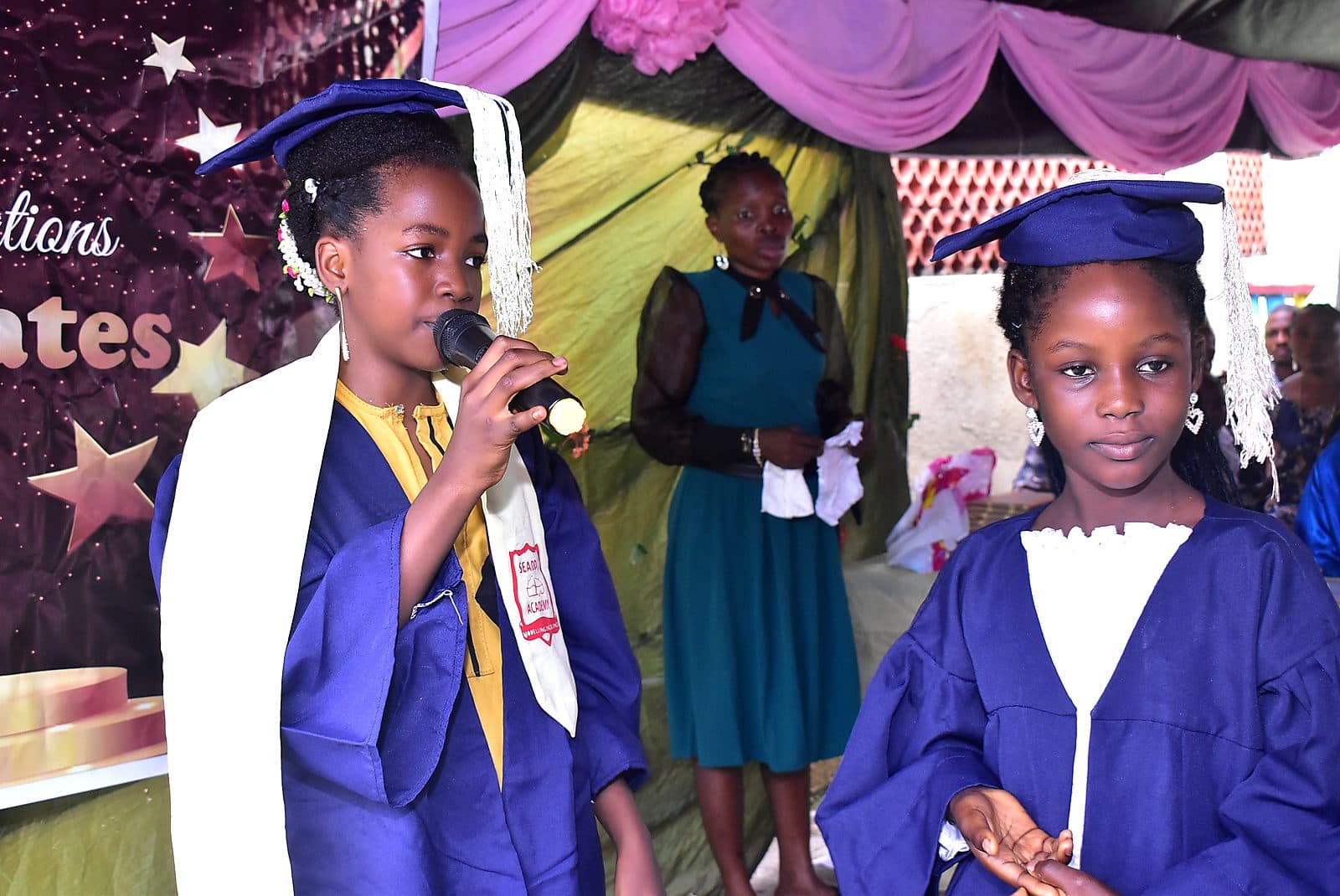 A graduate addressing parents at the ceremony