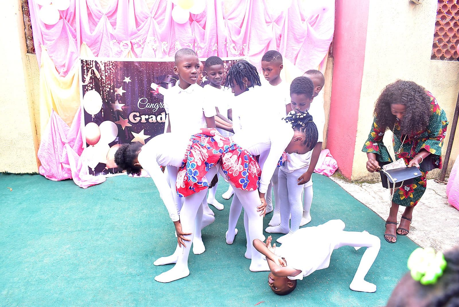 A gymnastic formation held together by a group of pupils