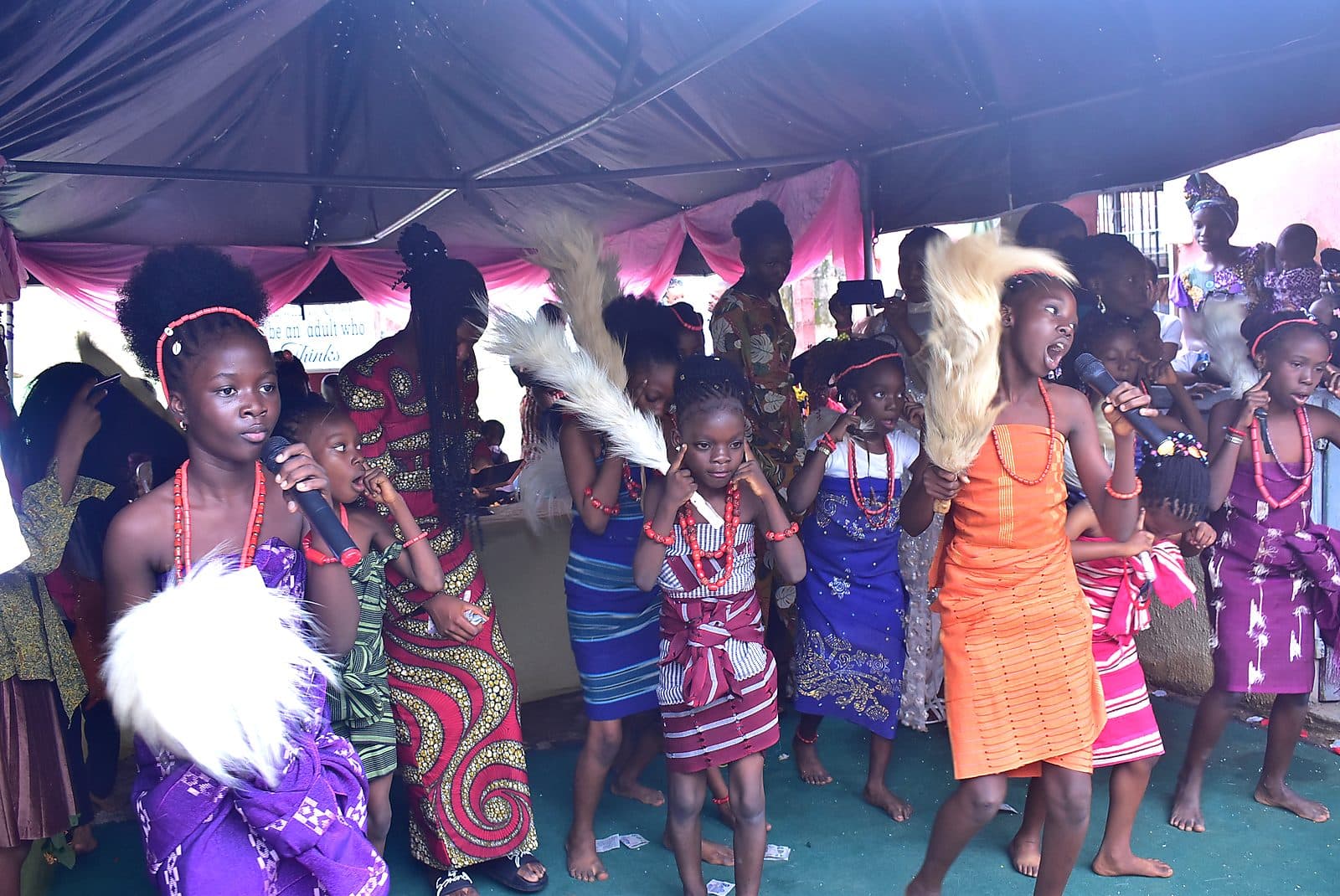 Dancers with horsetail whisks mid-performance