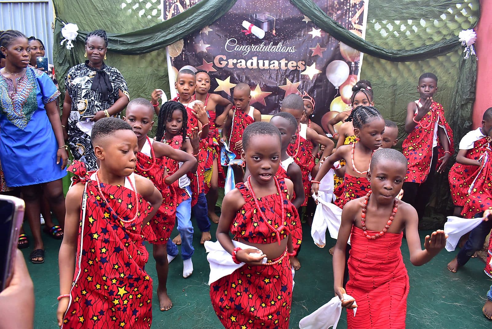 A large group of pupils performing together