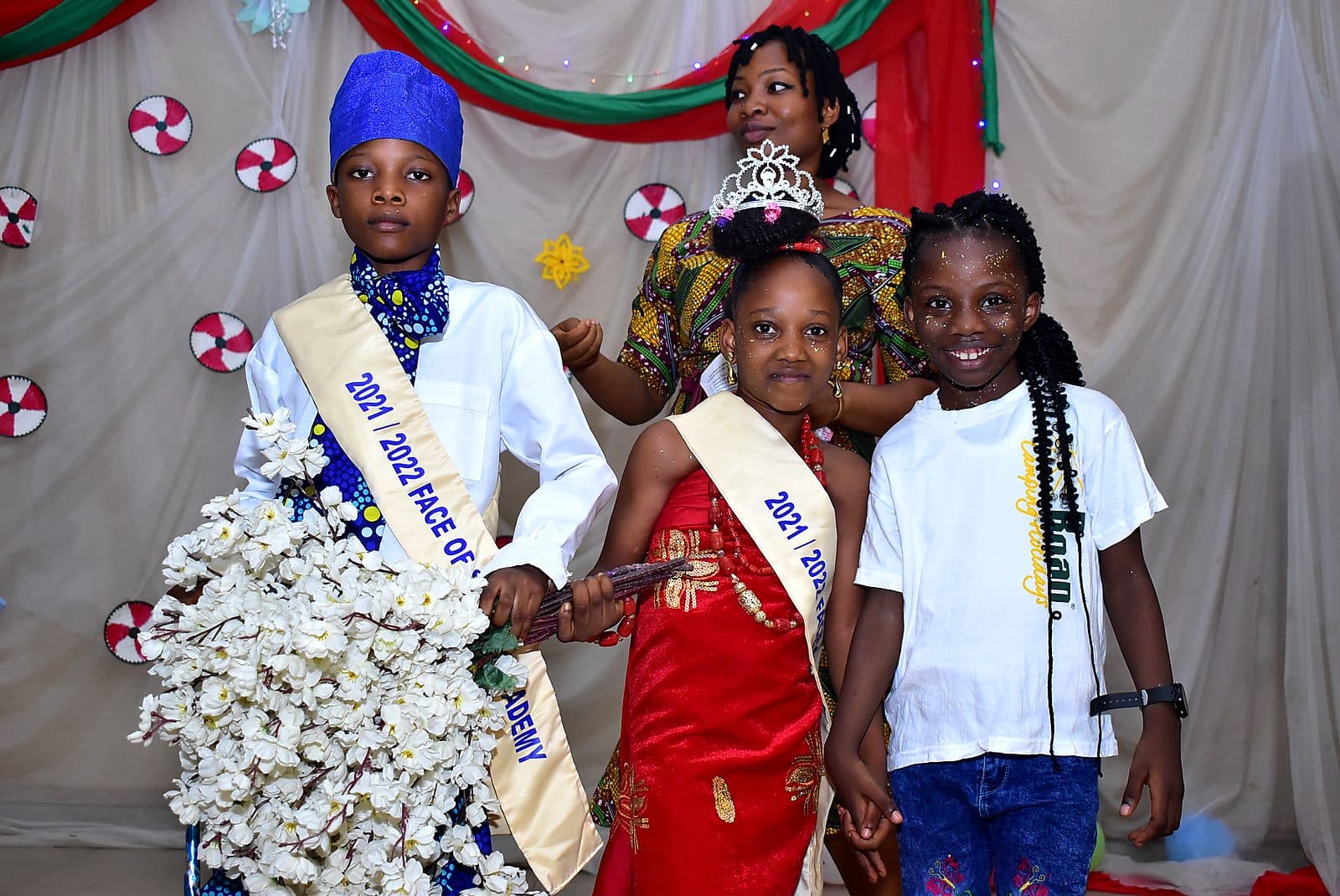 Pupils presented with sashes and flowers at the event