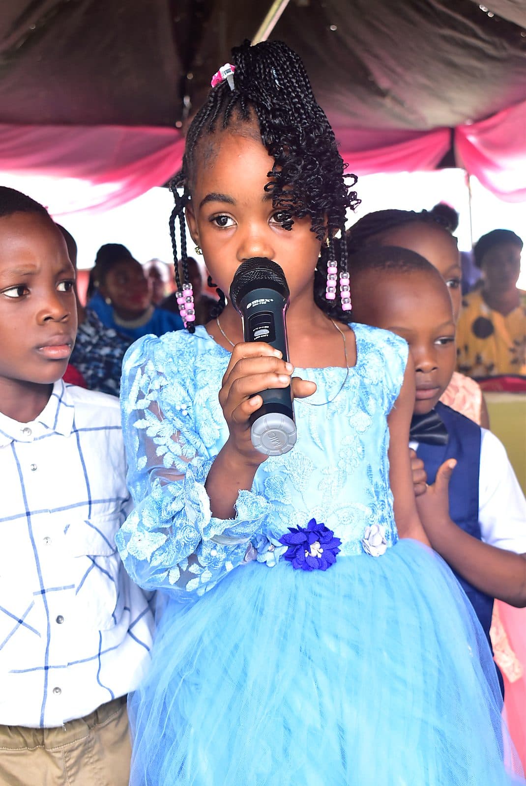 A pupil speaking to the audience